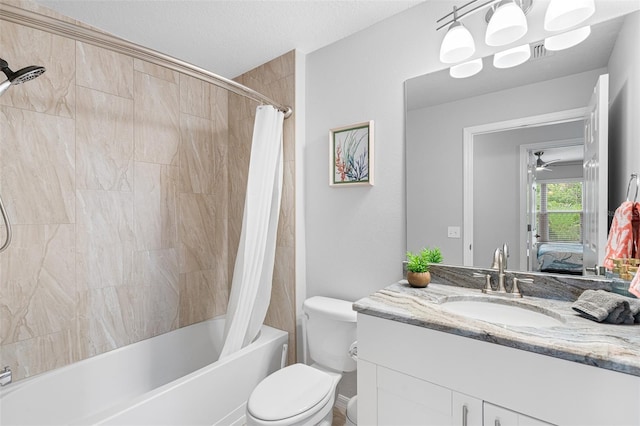 ensuite bathroom with toilet, ensuite bathroom, shower / bath combo, a textured ceiling, and vanity