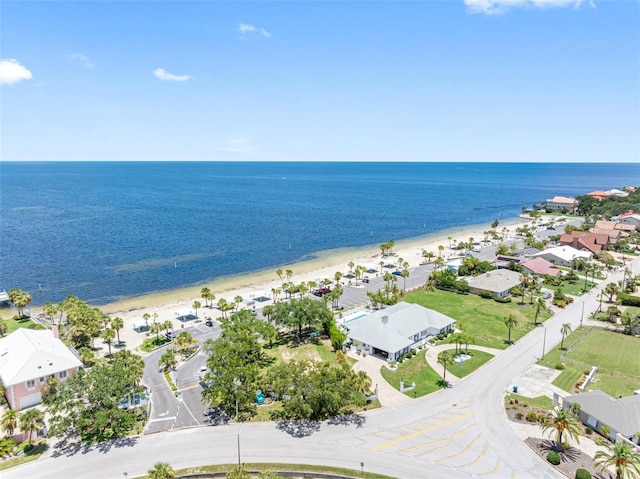 aerial view featuring a water view and a view of the beach