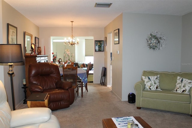 carpeted living area with visible vents, baseboards, and an inviting chandelier