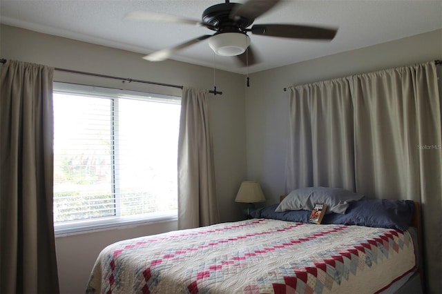 bedroom featuring a ceiling fan