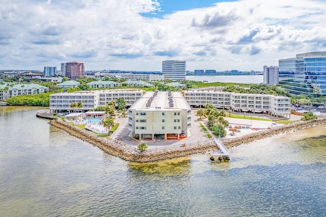 bird's eye view featuring a water view and a city view