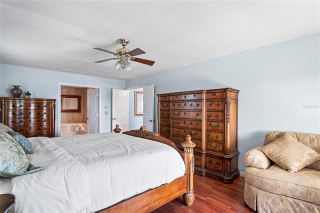 bedroom with ceiling fan, visible vents, wood finished floors, and ensuite bathroom