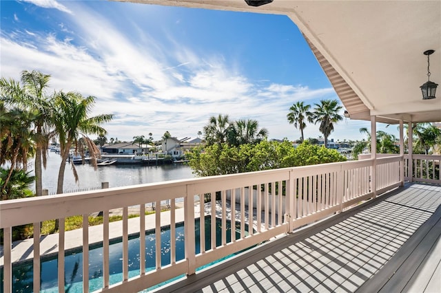 deck featuring a water view