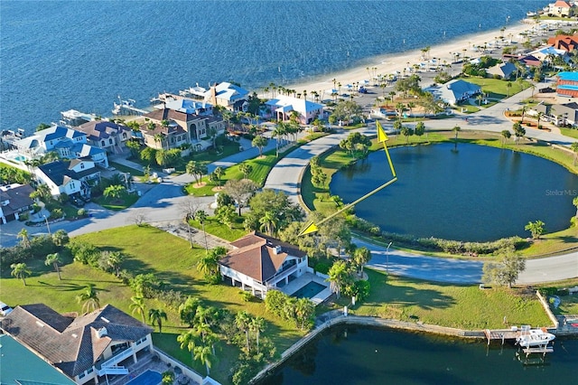 aerial view with a residential view and a water view