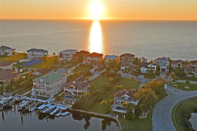 aerial view featuring a residential view and a water view