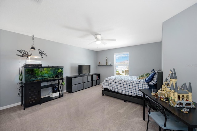 bedroom with carpet, baseboards, and ceiling fan