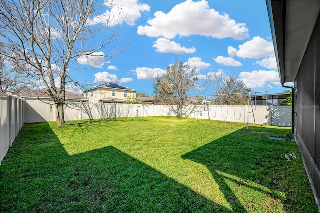 view of yard featuring a fenced backyard