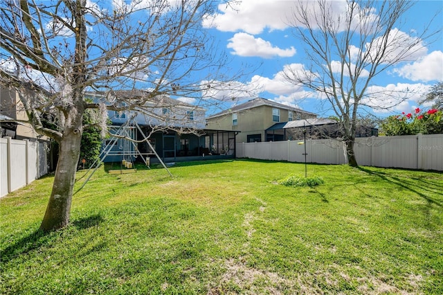 view of yard with a fenced backyard