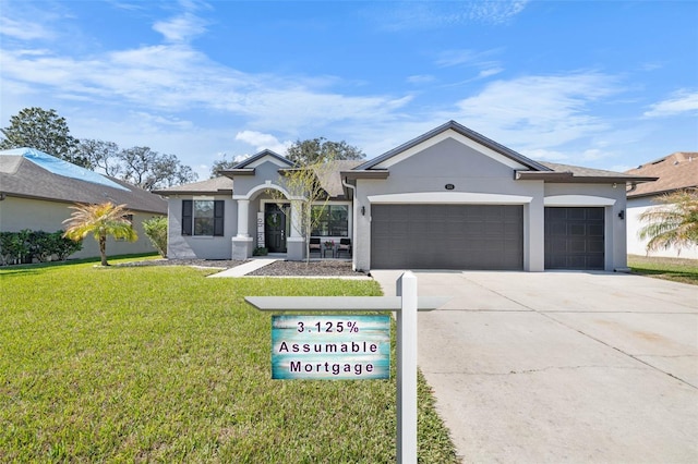 view of front of house with a garage, stucco siding, concrete driveway, and a front lawn