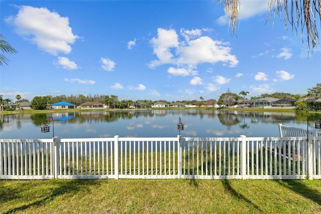 water view featuring a fenced backyard