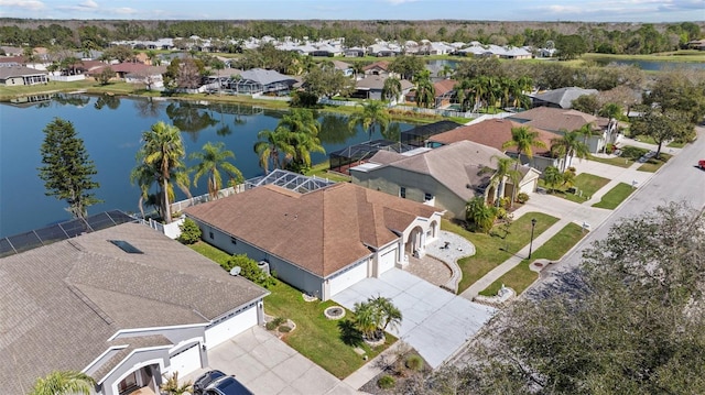 aerial view with a residential view and a water view