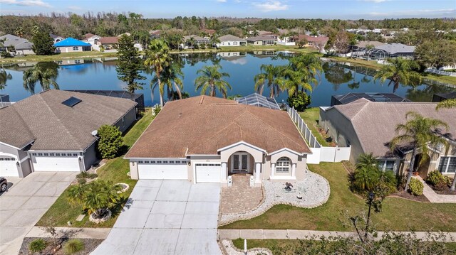 5117 Spectacular Bid Dr, Wesley Chapel, FL 33544 - aerial perspective of suburban area featuring a nearby body of water