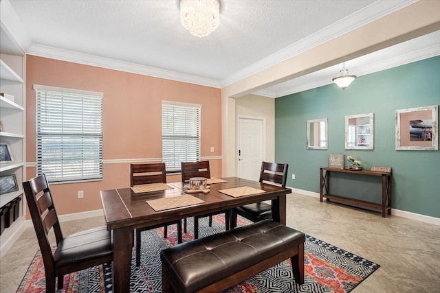 dining room featuring a textured ceiling, crown molding, and baseboards