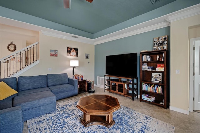 living room with baseboards, stairway, visible vents, and crown molding