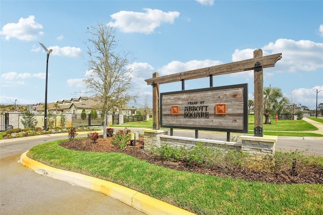 view of community with fence