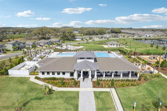 birds eye view of property with a residential view