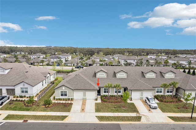 drone / aerial view with a residential view