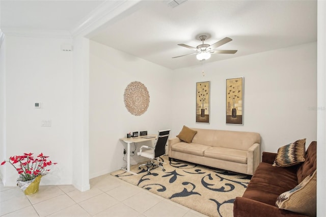 living area featuring tile patterned flooring, visible vents, crown molding, and ceiling fan