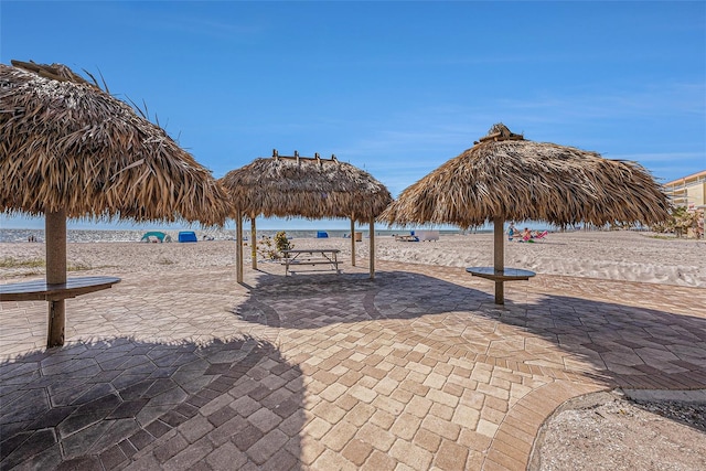 view of community featuring a gazebo and a patio