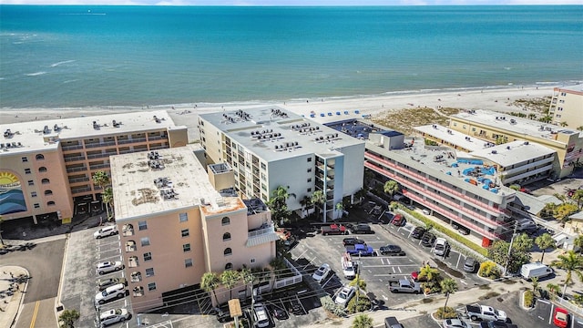 bird's eye view with a view of the beach and a water view