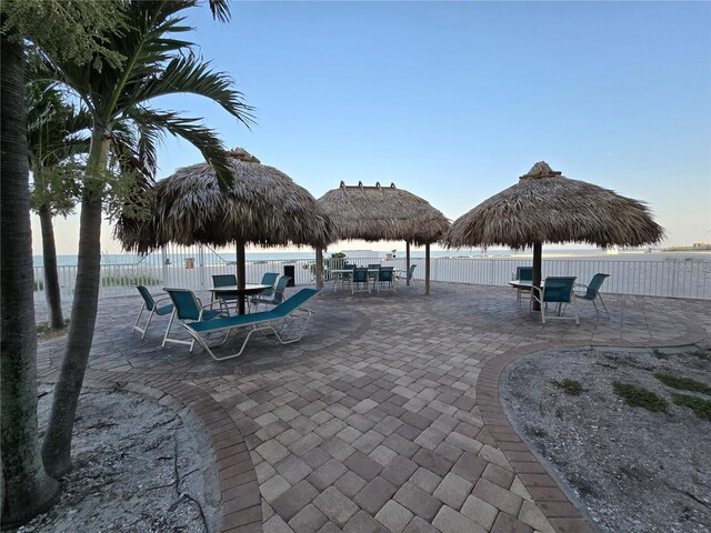 12924 Gulf Blvd Unit 110, Saint Petersburg, FL 33708 - view of home's community with outdoor dining space and a patio area