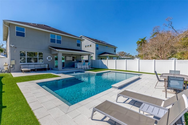 view of pool featuring a fenced in pool, a patio, a fenced backyard, an outdoor hangout area, and outdoor dining space