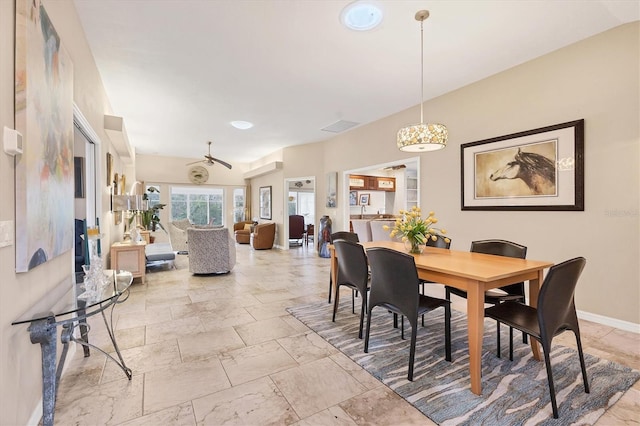 dining room featuring baseboards