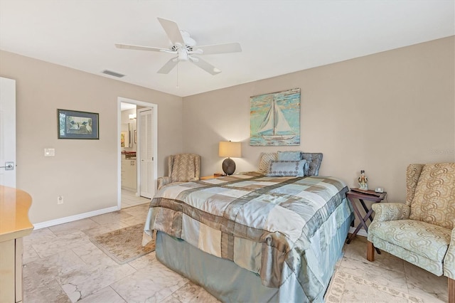 bedroom featuring ensuite bathroom, a ceiling fan, visible vents, baseboards, and marble finish floor