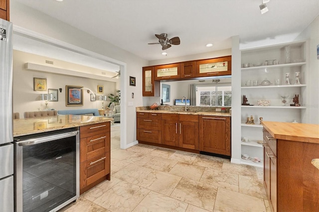 4579 Del Sol Blvd S, Sarasota, FL 34243 - bar with a ceiling fan, recessed lighting, a sink, wine cooler, and baseboards