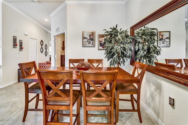 dining room with visible vents, baseboards, ornamental molding, light tile patterned flooring, and recessed lighting