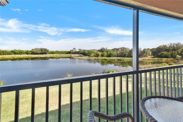 balcony featuring a water view