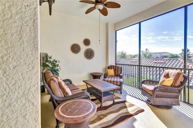 sunroom / solarium with ceiling fan