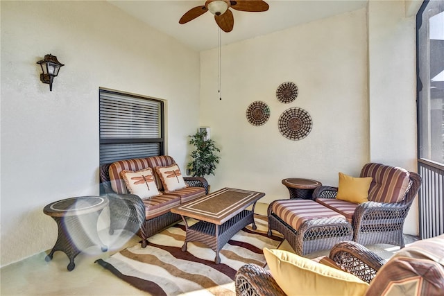 view of patio with outdoor lounge area and a ceiling fan