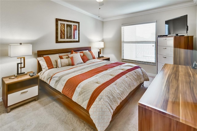 bedroom featuring light colored carpet and crown molding