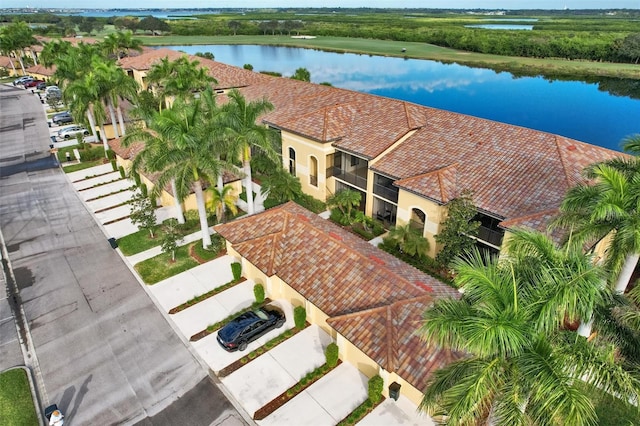 drone / aerial view with a water view