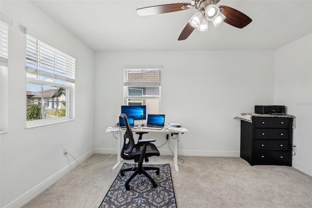 office area featuring carpet floors and baseboards