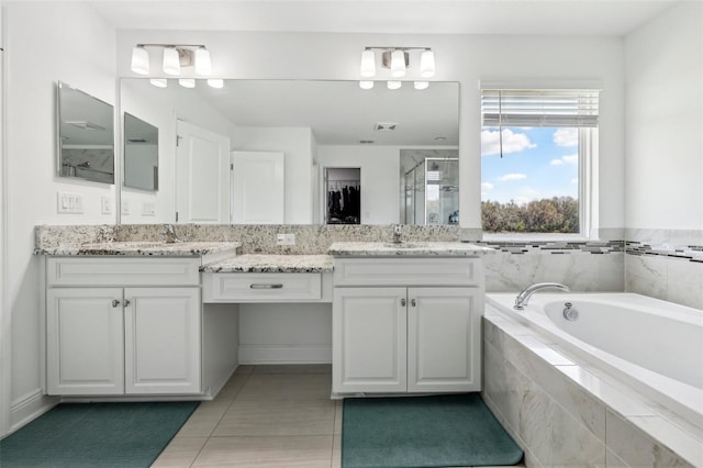 bathroom featuring visible vents, tile patterned floors, vanity, a shower stall, and a bath