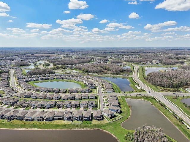 bird's eye view with a water view and a residential view