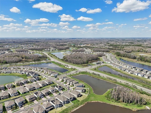 bird's eye view featuring a residential view and a water view