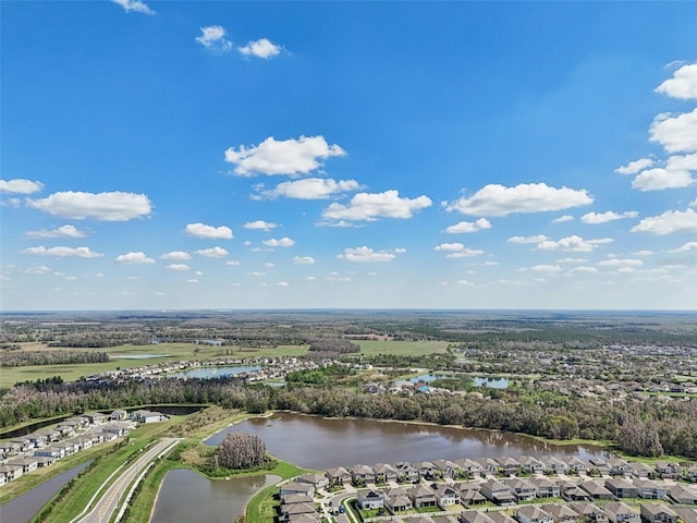 bird's eye view with a residential view and a water view