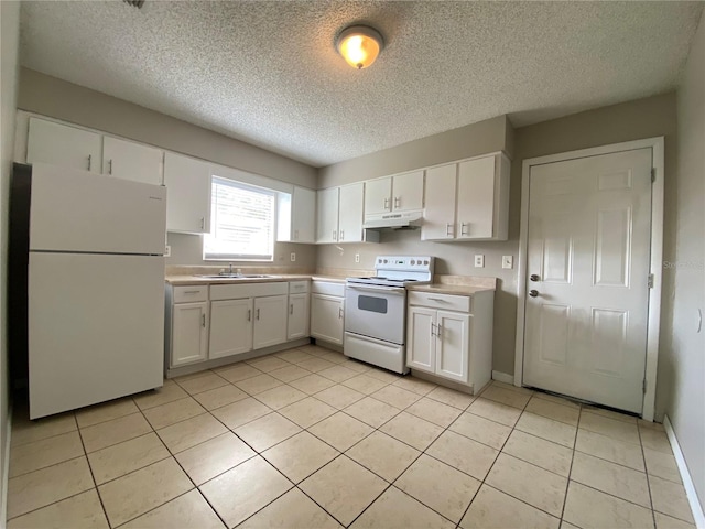 kitchen featuring under cabinet range hood, white appliances, white cabinets, and a sink