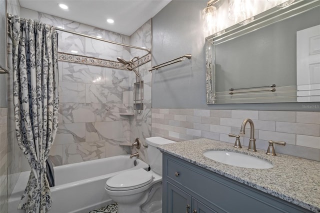 bathroom featuring toilet, shower / tub combo, vanity, and tile walls