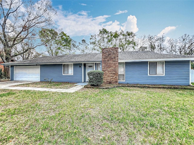 single story home featuring a garage, concrete driveway, a front lawn, and a chimney