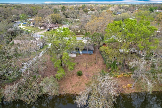 bird's eye view featuring a water view and a wooded view