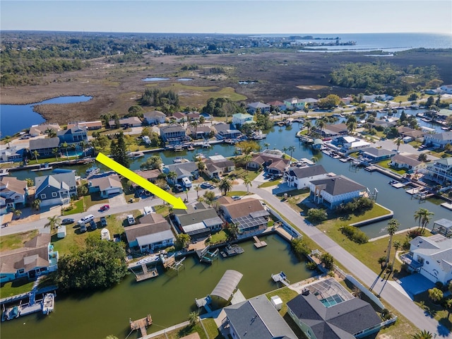 aerial view with a residential view and a water view