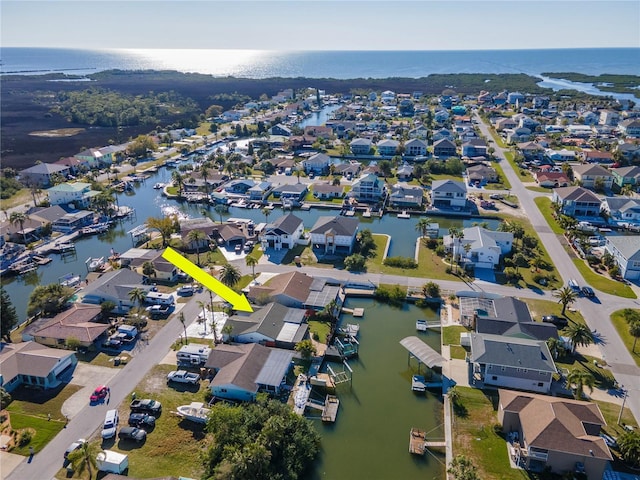 aerial view featuring a residential view and a water view