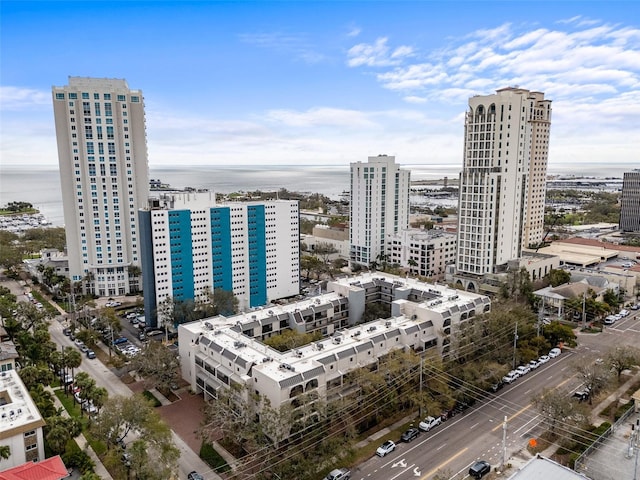 bird's eye view featuring a water view and a city view