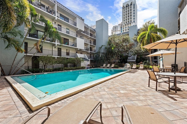 pool with a patio area