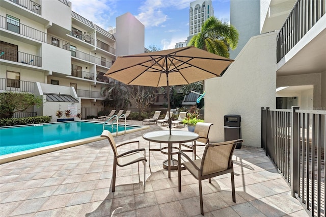 community pool featuring a patio