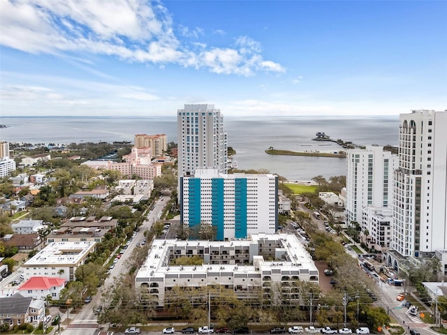 bird's eye view featuring a water view and a city view